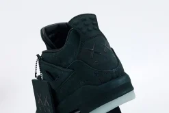 KAWS x Air Jordan 4 Retro 'Black' replica